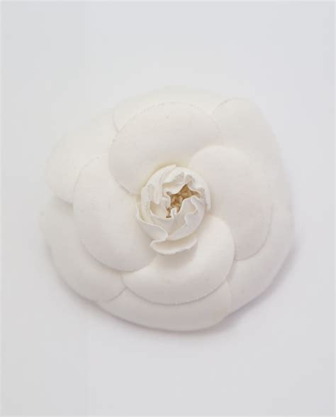 chanel camellia brooches.